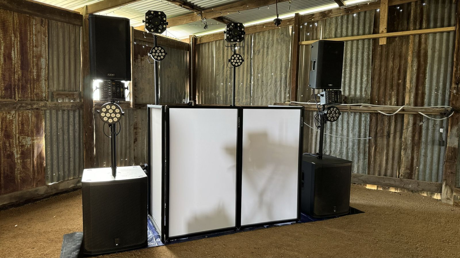 DJ setup in a corrugated iron shed venue